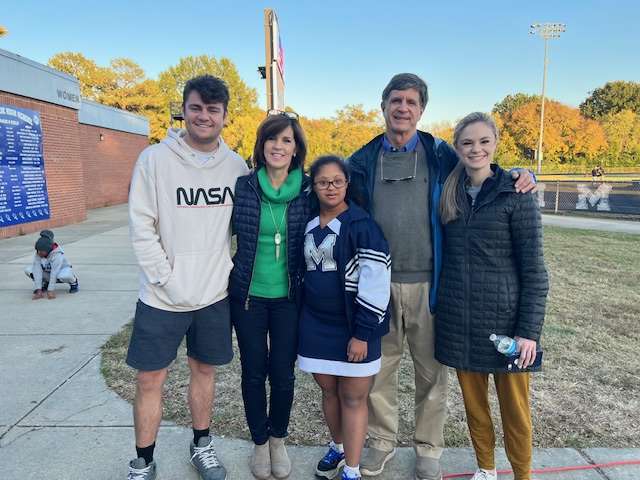 Dr. Singletary with Sophia, a Millbrook High School cheerleader