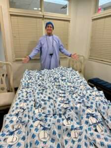 Dr. Macon Singletary with oral kits to donate to Triangle Walk