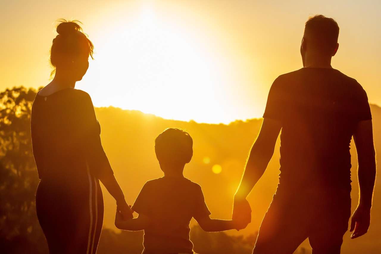 family walking hand in hand